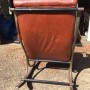 Lee L. Woodard Leather and Steel Rocking Chair